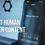 A blog banner with the text "PROMPT HUMAN WRITTEN CONTENT FOR AI" overlaid on an image of a laptop displaying a circuit board head icon and a smartphone showing a ChatGPT interface. The top right corner has "AiSparkify".